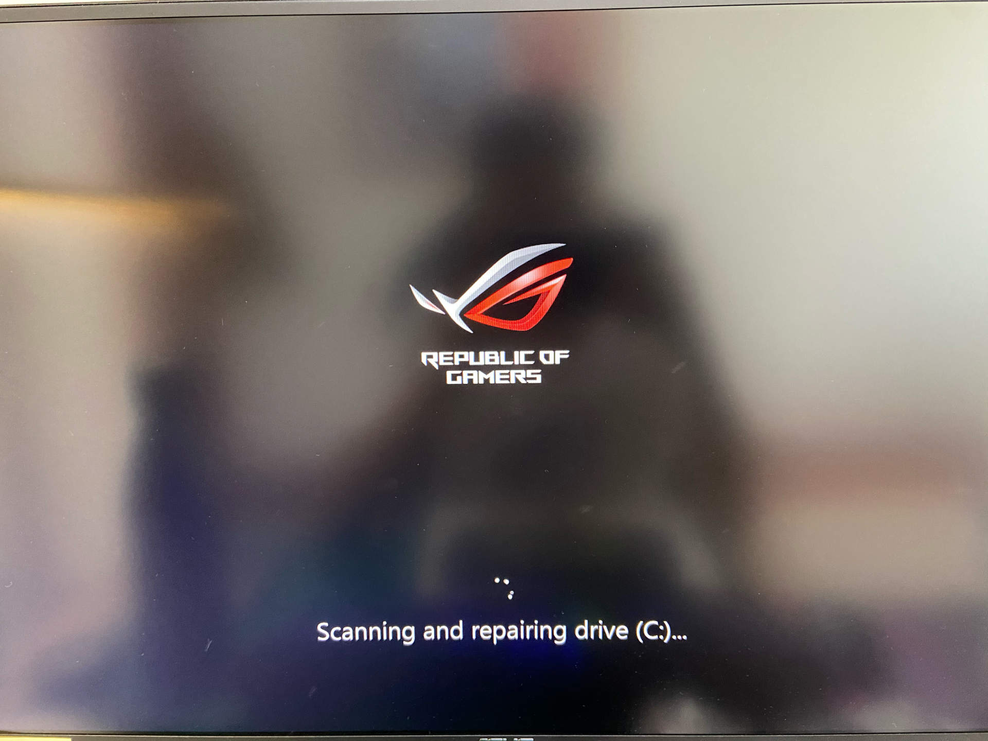 asus rog scanning and repairing drive